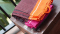 Brown Checkered Patteda Anchu Handloom Saree with Orange and Pink Border