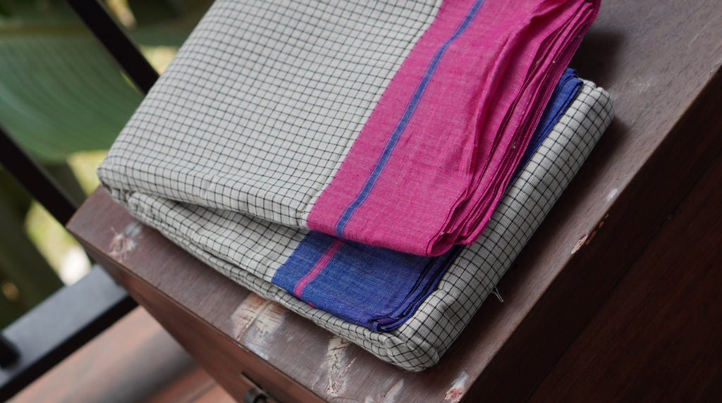 White Checkered Patteda Anchu Handloom Saree with Blue and Pink Borders