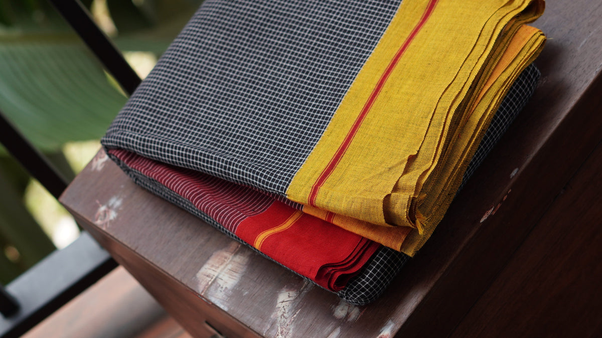 Black Patteda Anchu Handloom Saree with Yellow and Red Border