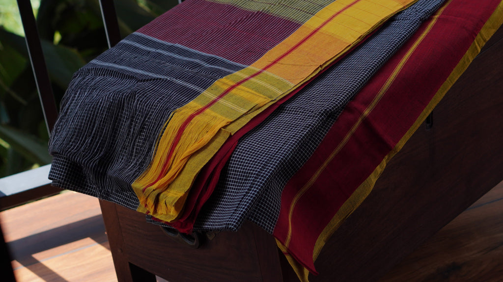Black Patteda Anchu Handloom Saree with Yellow and Red Border