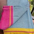 Light Sky Blue Checkered Patteda Anchu Handloom Saree with Pink and Yellow Border
